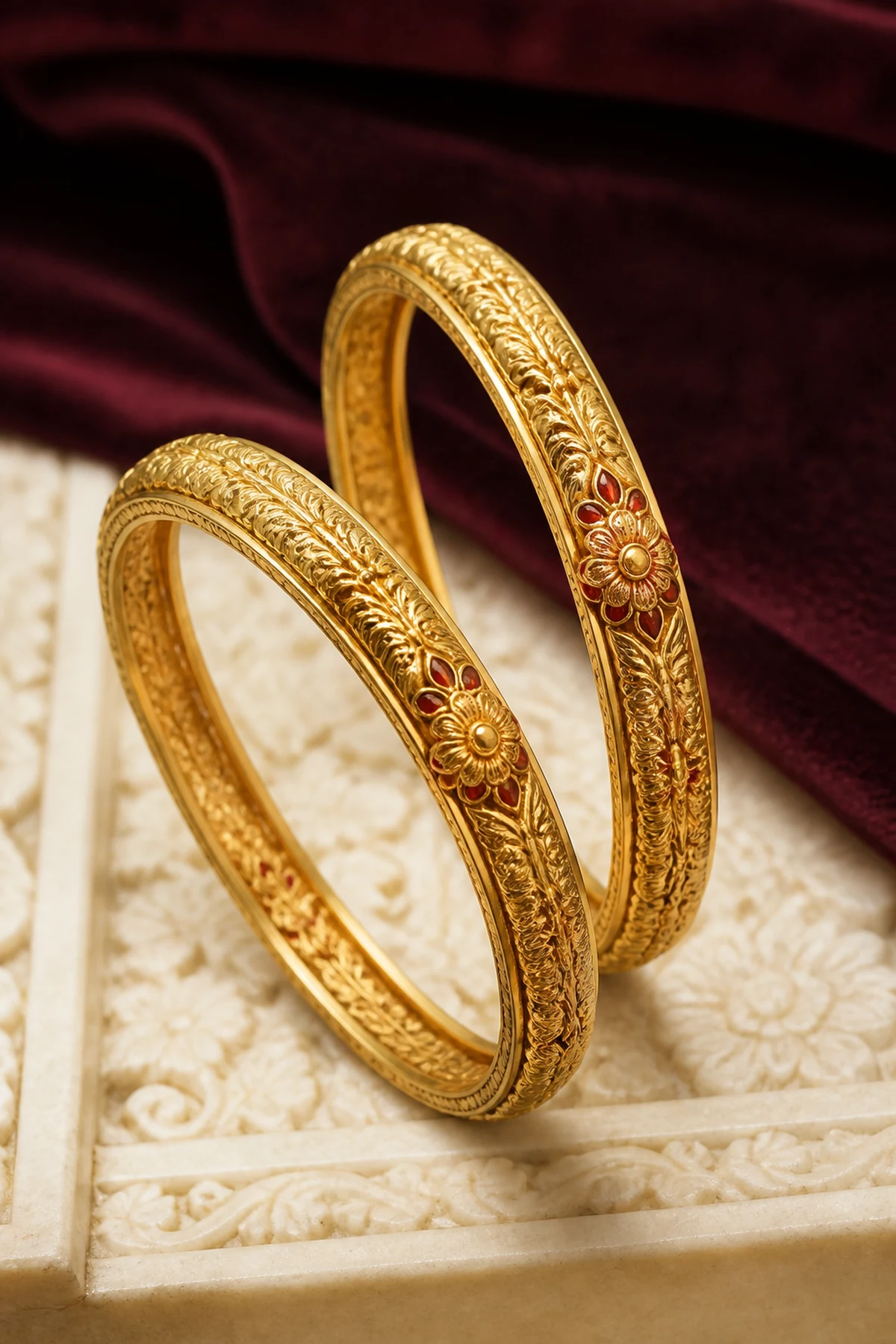 Pair of engraved gold nakshi kadas
